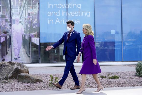 First lady Jill Biden arrives to tour an Intel facility, Monday, March 7, 2022, at Intel Corp's Ocotillo Campus in Chandler, Ariz. (AP Photo/Matt York)