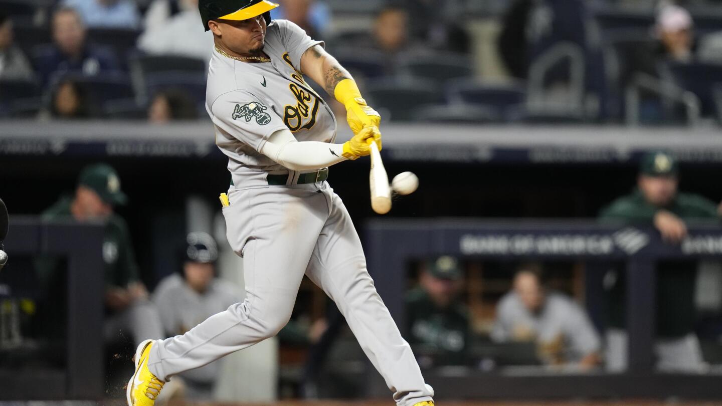 Oakland A's rookie drives in four runs in MLB debut, references