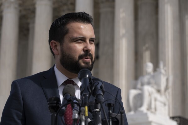 Chairman of the Colorado Republican Party Dave Williams speaks in front of the U.S. Supreme Court, Thursday, Feb. 8, 2024, in Washington. (AP Photo/Manuel Balce Ceneta)