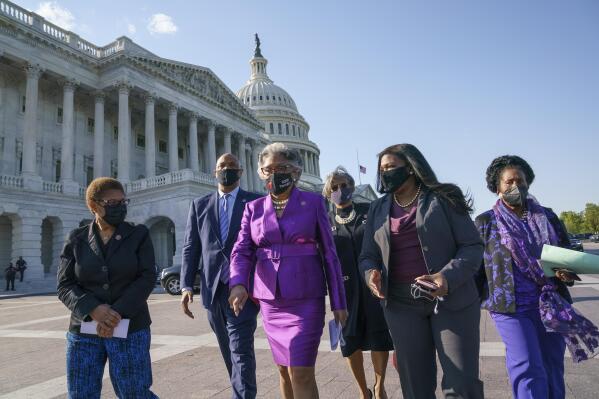 Members of the Congressional Black Caucus walk to make a make a statement on the verdict in the murder trial of former Minneapolis police Officer Derek Chauvin in the death of George Floyd, on Capitol Hill in Washington, Tuesday, April 20, 2021. From left are Rep. Karen Bass, D-Calif., Rep. Andre Carson, D-Ind. Rep. Joyce Beatty, D-Ohio, chair of the Congressional Black Caucus, Rep. Brenda Lawrence, D-Mich., Rep. Cori Bush, D-Mo., and Rep. Sheila Jackson Lee, D-Tex. (AP Photo/J. Scott Applewhite)