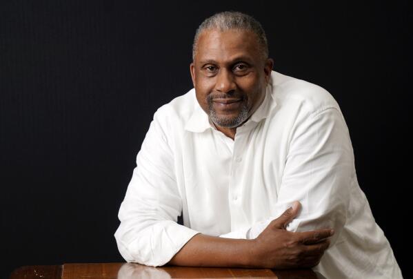 Tavis Smiley, owner of progressive talk radio station KBLA Los Angeles (1580), poses for a portrait, Tuesday, June 15, 2021, in Los Angeles. (AP Photo/Chris Pizzello)