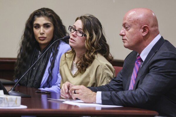 Hannah Gutierrez-Reed, the weapons supervisor on the set of the Western film “Rust," center, speaks to Judge T. Glenn Ellington during her plea hearing at the First Judicial District Courthouse in Santa Fe, N.M., Monday, Oct. 7, 2024. (Gabriela Campos/Santa Fe New Mexican via AP, Pool)