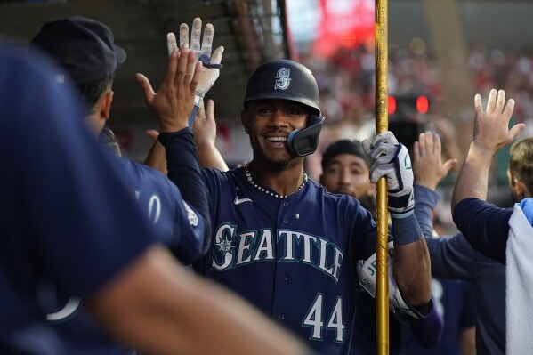 Moore homers twice and Rodriguez sets hits record as Mariners rout