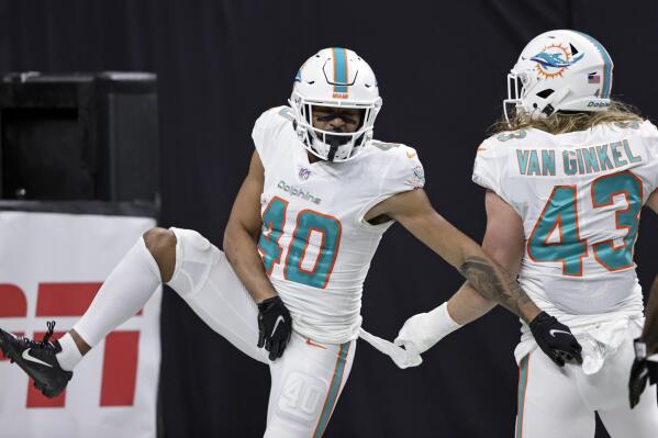 Waddle shines, Dolphins beat Saints 20-3 to win 7th straight