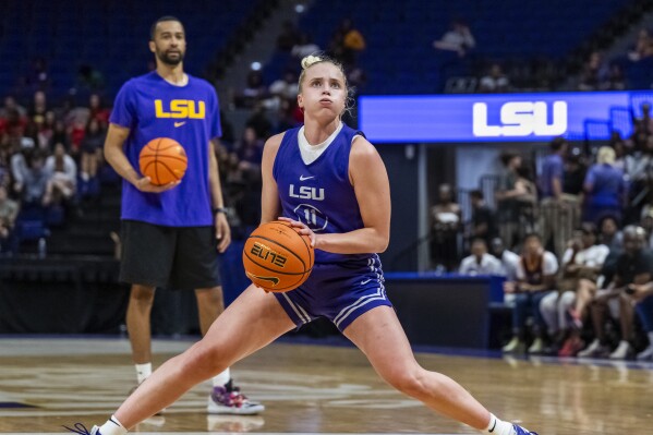 LSU guard Hailey Van Lith (11) makes a move before pulling up for a jump shot during practice at the Pete Maravich Assembly Center in Baton Rouge, La., Monday, Sept. 25, 2023. LSU is ranked No. 1 in the AP Top 25 preseason women's basketball poll, released Tuesday, Oct. 17, 2023. There's clearly a lot of optimism around LSU as they return a stellar group, including Angel Reese and added two huge transfers with Hailey Van Lith and Aneesah Morrow.(Michael Johnson/The Advocate via AP)