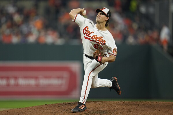 Baltimore Orioles starting pitcher Dean Kremer throws to the Boston Red Sox during the second inning of a baseball game, Thursday, Sept. 28, 2023, in Baltimore. (AP Photo/Julio Cortez)