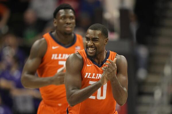 Illinois' Da'Monte Williams celebrates after making a basket during the first half of an NCAA college basketball game against Kansas StateTuesday, Nov. 23, 2021, in Kansas City, Mo. (AP Photo/Charlie Riedel)