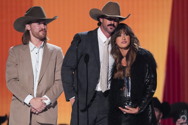 Will Bunny, from left, Riley Green, and Ella Langley accept the award for single of the year for "You Look Like You Love Me" during the 60th annual Academy of Country Music Awards on Thursday, May 8, 2025, in Frisco, Texas. (AP Photo/Chris Pizzello)