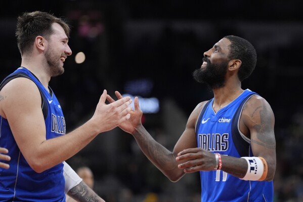 Luka Doncic's Mavs Pull Away Late for Blowout Win Over Sixers in Kyrie  Irving's Injury Return - Sports Illustrated Dallas Mavericks News, Analysis  and More