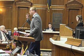Indiana state Rep. Ethan Manning, R-Logansport, speaks about a bill he sponsored to ban the state pension funds from socially and environmentally conscious investing during Indiana House debate on Monday, April 24, 2023, in Indianapolis. House members voted to approve the bill, sending it to Gov. Eric Holcomb for consideration. (AP Photo/Tom Davies) Thanks, Tom Davies