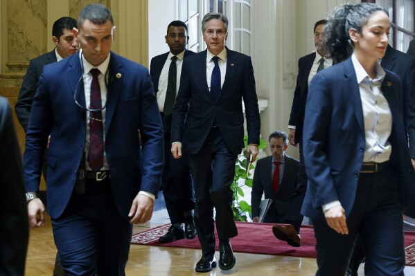 U.S. Secretary of State Antony Blinken, centre, walks to meet with Egyptian Foreign Minister Sameh Shoukry, in Cairo, Egypt, Thursday, March 21, 2024. (Evelyn Hockstein/Pool Photo via AP)
