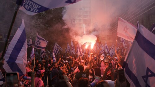 Israelis protest against plans by Prime Minister Benjamin Netanyahu's government to overhaul the judicial system in Tel Aviv, Israel, Tuesday, July 18, 2023. (AP Photo/Oded Balilty)