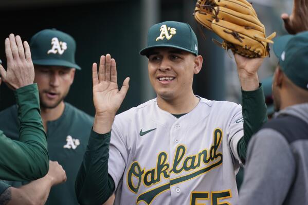 Road teams sweep unusual A's-Tigers doubleheader