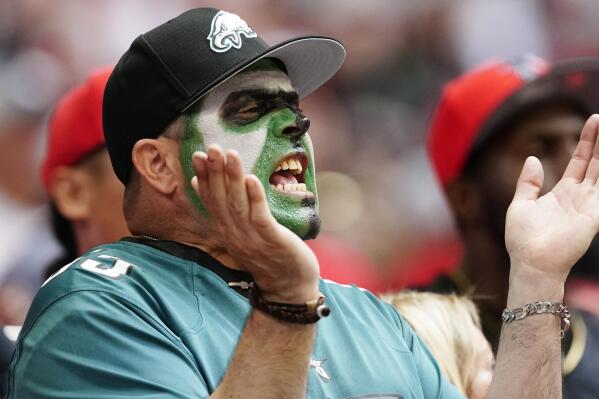 A Philadelphia Eagles fan cheers on his team during the game