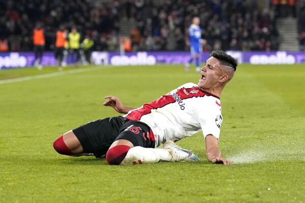 Southampton's Carlos Alcaraz celebrates scoring their side's first goal of the game during their English Premier League soccer match against Leicester City at St. Mary's Stadium, Southampton, England, Saturday, March 4, 2023. (Andrew Matthews/PA via AP)