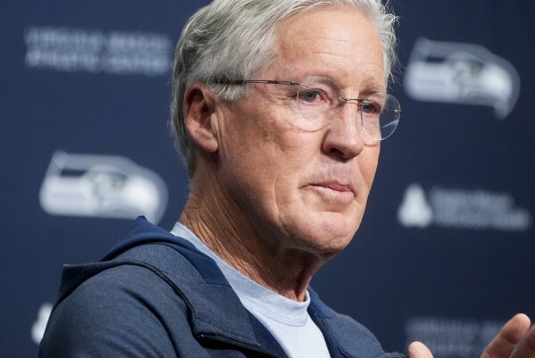 Former Seattle Seahawks head coach Pete Carroll becomes emotional while speaking during a media availability after it was announced he will not return as head coach next season, Wednesday, Jan. 10, 2024, at the NFL football team's headquarters in Renton, Wash. Carroll will remain with the organization as an advisor. (AP Photo/Lindsey Wasson)