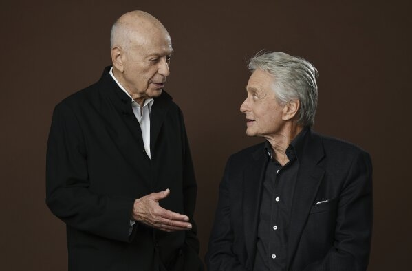 
              In this Nov. 7, 2018 photo, Alan Arkin, left, and Michael Douglas, cast members in the Netflix comedy series "The Kominsky Method," appear at the Beverly Wilshire Four Seasons hotel in Beverly Hills, Calif. The pair play Hollywood veterans facing the indignities of aging in a change-of-pace comedy-drama from sitcom hitmaker Chuck Lorre. (Photo by Chris Pizzello/Invision/AP)
            