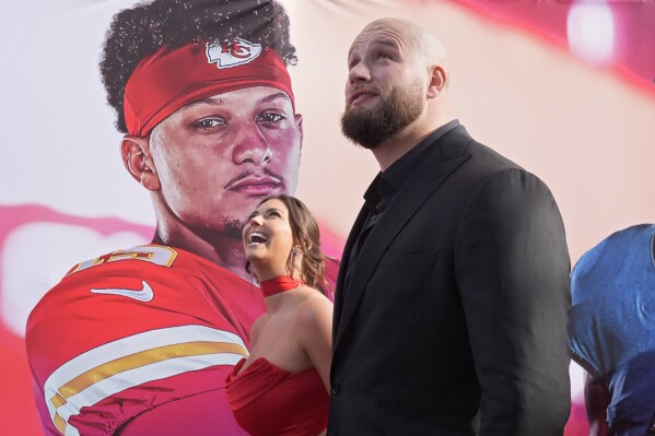 Lane Johnson of the Philadelphia Eagles walks on the red carpet at the NFL Honors award show ahead of the Super Bowl 58 football game Thursday, Feb. 8, 2024, in Las Vegas. (AP Photo/Charlie Riedel)