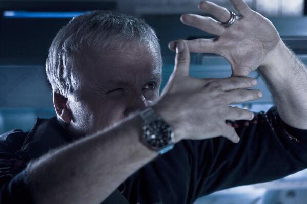 This 2009 image released by 20th Century Films shows filmmaker James Cameron on the set of "Avatar."  Cameron's long-awaited "Avatar" sequel, "The Way of the Water" will be released later this year.  On Friday, “Avatar” will be re-released in theaters. (Zack Fellman/20th Century Films via AP)