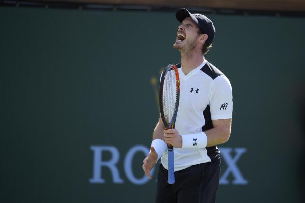 Andy Murray, of Great Britain, reacts during a match against Federico Delbonis, of Argentina, at the BNP Paribas Open tennis tournament, Monday, March 14, 2016, in Indian Wells, Calif. Delbonis defeated Murray in the match. (AP Photo/Mark J. Terrill)