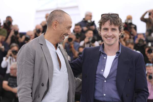 Director Oliver Hermanus from left and Paul Mescal pose for photographers on the photo call for the film 