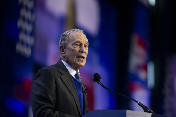 FILE - In this March 2, 2020, file photo Democratic presidential candidate and former New York City Mayor Mike Bloomberg speaks at the the American Israel Public Affairs Committee (AIPAC) 2020 Conference in Washington. The billionaire former New York City mayor is spending tens of millions of dollars to bolster social services, feed first responders and help local officials trace the spread of the coronavirus in the city that has become the epicenter of the pandemic in the United States. (AP Photo/Alex Brandon)