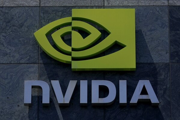 FILE - A sign on the Nvidia office building is shown in Santa Clara, Calif., on May 31, 2023. On Wednesday, June 5, 2024, Nvidia's market value toppped $3 trillion amid soaring demand for its semiconductors in AI applications. (AP Photo/Jeff Chiu, File)