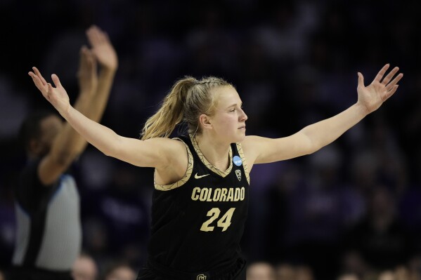 Colorado guard Maddie Nolan celebrates after making a basket during the first half of a second-round college basketball game against Kansas State in the women's NCAA Tournament in Manhattan, Kan., Sunday, March 24, 2024, in Manhattan, Kan. (AP Photo/Charlie Riedel)
