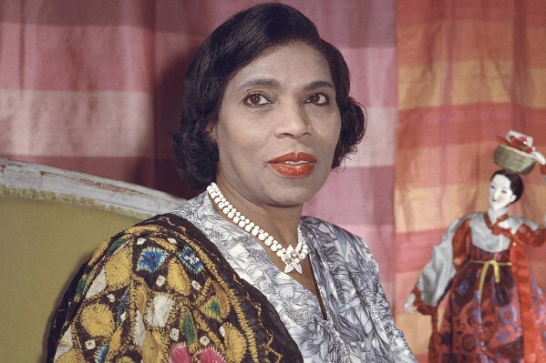 FILE - Singer Marian Anderson, a member of the U.S. delegation to the United Nations, appears in her New York apartment on Aug. 5, 1958. (AP Photo, File)
