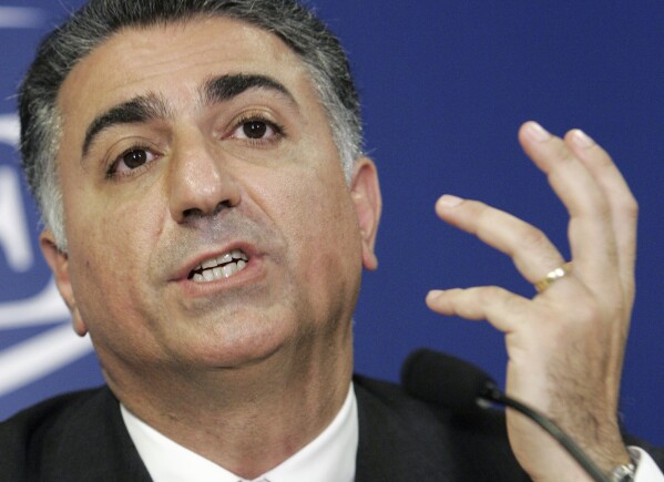 Reza Pahlavi, the son of Iran's toppled Shah Mohammad Reza Pahlavi, holds a news conference in Paris on June 7, 2006. (AP Photo/Jacques Brinon, File)