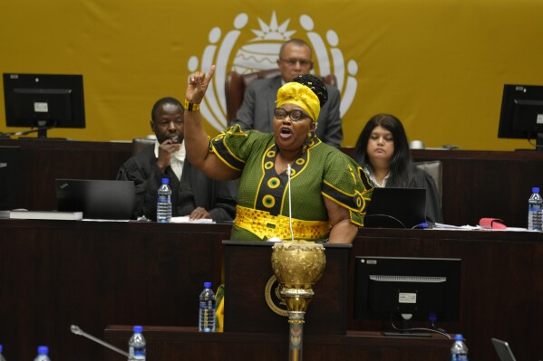 Pemmy Majodina, chief whip of the ruling African National Congress, addresses members of parliament in Cape Town, South Africa, Tuesday, Nov. 21, 2023. The majority of MP's voted to close the Israeli embassy in South Africa over the war in Gaza. (AP Photo/Nardus Engelbrecht)