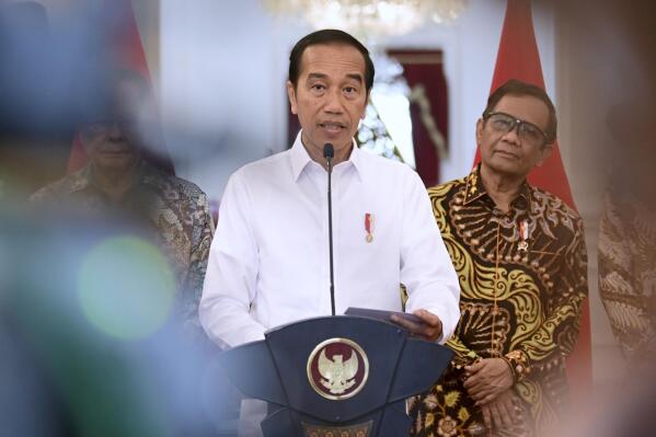 In this photo released by the Press and Media Bureau of the Indonesian Presidential Palace, Indonesian President Joko Widodo delivers a speech at the Merdeka Palace in Jakarta, Indonesia, Wednesday, Jan. 11, 2023. Widodo admitted that serious human rights violations had occurred across the nation in the past, pledged to compensate the victims and their families and vowed it will not happen again in the future. (Muchlis Jr/Indonesian Presidential Palace via AP)