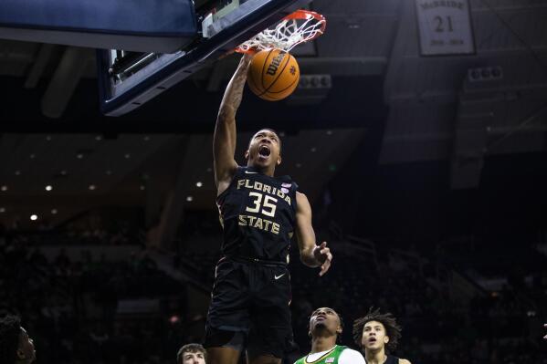 Florida State's Matthew Cleveland (35) dunks during the first half of the team's NCAA college basketball game against Notre Dame on Tuesday, Jan. 17, 2023, in South Bend, Ind. (AP Photo/Michael Caterina)
