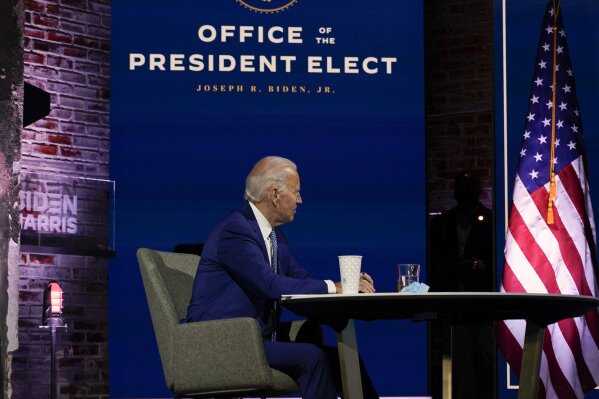 President-elect Joe Biden listens during a meeting with his COVID-19 advisory council, Monday, Nov. 9, 2020, at The Queen theater in Wilmington, Del. (AP Photo/Carolyn Kaster)