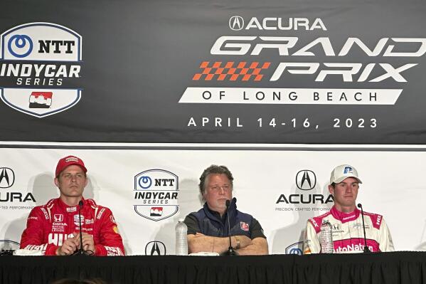 Marcus Ericsson, left, Michael Andretti, center, and Kyle Kirkwood attend a news conference for the IndyCar Grand Prix of Long Beach auto race, Saturday, April 15, 2023 in Long Beach, Calif. Kirkwood, a native of Jupiter, Florida, won the pole and will lead the field to green Sunday in the most prestigious road course race in the United States. Ericsson of Sweden qualified second. (AP Photo/Jenna Fryer)