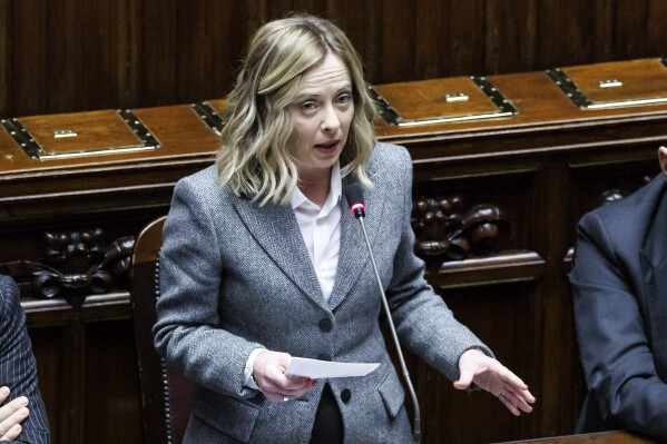 FILE - Italian Premier Giorgia Meloni addresses the Chamber of Deputies of the Italian Parliament in Rome Wednesday, Jan. 24, 2024. Italian Premier Giorgia Meloni slammed carmaker Stellantis in parliament this week, accusing it of weakening Italy’s industrial footprint since the merger of FiatChrysler and PSA Peugeot that created the world’s fourth largest auto maker. (Roberto Monaldo/LaPresse via AP, File)