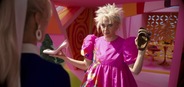 This image released by Warner Bros. Pictures shows Kate McKinnon in a scene from "Barbie." (Warner Bros. Pictures via AP)