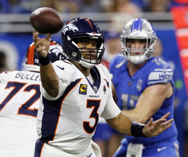 FILE - Denver Broncos quarterback Russell Wilson (3) throws during the first half of an NFL football game against the Detroit Lions, Dec. 16, 2023, in Detroit. Wilson has agreed to sign a one-year deal with the Pittsburgh Steelers, a person familiar with the details told The Associated Press on Sunday night, March 10, 2024. (AP Photo/Duane Burleson, File)