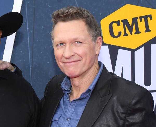 FILE - Craig Morgan arrive at the CMT Music Awards in Nashville, Tenn., on April 11, 2022. Morgan's six-track EP, titled “Enlisted,” is out Friday. (AP Photo/John Amis, File)