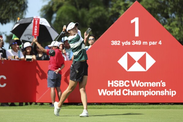 Lydia Ko of New Zealand is plays her first tee shot during the first round of the HSBC Women's Wold Championship at the Sentosa Golf Club in Singapore Thursday, Feb. 29, 2024. (AP Photo/Danial Hakim)