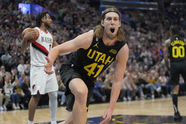 Kelly Olynyk of the Utah Jazz shoots in the game against the Denver