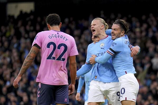 Manchester City's Erling Haaland, centre, celebrates after scoring the opening goal during the English Premier League soccer match between Manchester City and Everton at the Etihad Stadium in Manchester, England, Saturday, Dec. 31, 2022. (Tim Goode/PA via AP)