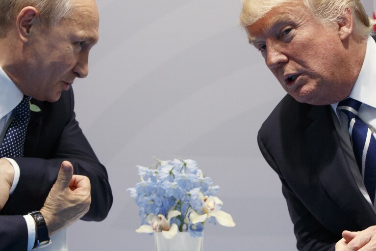FILE – Then-U.S. President Donald Trump, right, meets with Russian President Vladimir Putin at the G20 Summit in Hamburg, Germany, Friday, July 7, 2017. While in power, Trump derided the leaders of some friendly nations while praising authoritarians such as Putin. As chances rise of a Joe Biden-Trump rematch in the U.S. presidential election race, America’s allies are bracing for a bumpy ride. (AP Photo/Evan Vucci, File)