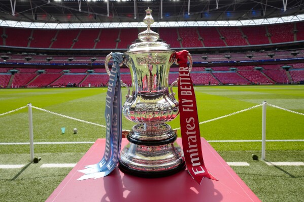 FILE - The FA Cup trophy is seen before the English FA Cup final soccer match between Manchester City and Manchester United at Wembley Stadium in London, Saturday, June 3, 2023. Barnsley was expelled from this season鈥檚 FA Cup on Wednesday after it fielded an ineligible player in professional soccer鈥檚 oldest knockout competition. The English division three team said an 鈥渁dministrative error鈥� was to blame for fielding the unnamed player in its first round replay against Horsham. (AP Photo/Jon Super, File)