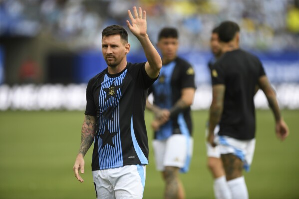 Di Maria scores, Messi returns in Argentina's Copa America warmup victory  over Ecuador | AP News