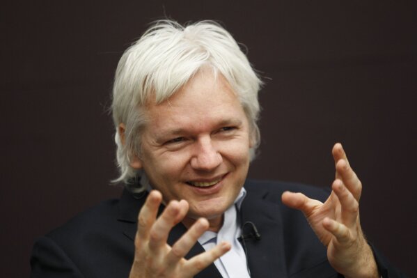 
              FILE - In this Dec. 1, 2011, file photo, WikiLeaks founder Julian Assange gestures as he speaks during a news conference in central London. The arrest of Assange reignites a debate with no easy answer: Is the former computer hacker and founder of WikiLeaks a journalist or not? His lawyers are quick to characterize the case against him as a threat to all journalists. (AP Photo/Lefteris Pitarakis, File)
            