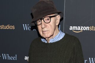 FILE - Director Woody Allen attends a special screening of "Wonder Wheel" on Nov. 14, 2017, in New York. A docuseries about the relationship of Woody Allen and Mia Farrow and its fallout is coming to HBO. The four-part documentary series is titled "Allen v. Farrow" and will debut Feb. 21, 2021, on HBO. (Photo by Evan Agostini/Invision/AP, File)