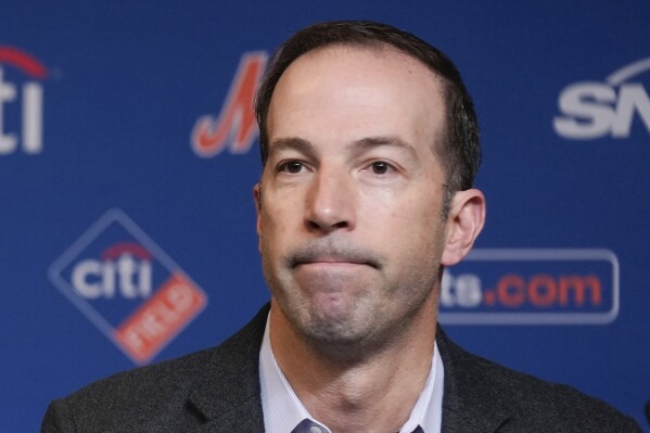 FILE - Then-New York Mets general manager Billy Eppler looks on during a baseball news conference at Citi Field, Tuesday, Dec. 20, 2022, in New York. Former New York Mets general manager Billy Eppler was suspended through this year's APSeries on Friday , Feb. 9, 2024, by baseball Commissioner Rob Manfred, who concluded he and other team employees fabricated injuries to create open roster spots.(APPhoto/Seth Wenig, File)