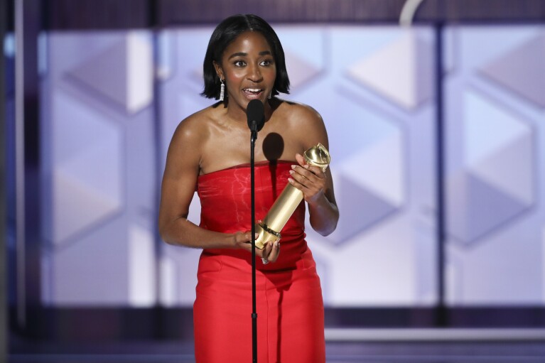 This image released by CBS shows Ayo Edebiri accepting the award for best performance by a female actor in a TV series for her role in "The Bear" during the 81st Annual Golden Globe Awards in Beverly Hills, Calif., on Sunday, Jan. 7, 2024. (Sonja Flemming/CBS via AP)