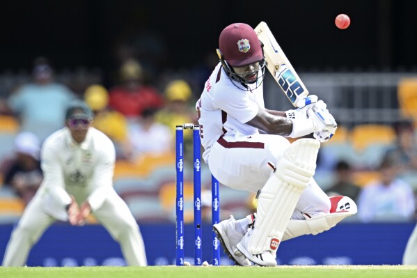 West Indies' Kirk McKenzie bats against Australia on the third day of their cricket test match in Brisbane, Saturday, Jan. 27, 2024. (Darren England/AAP Image via AP)
